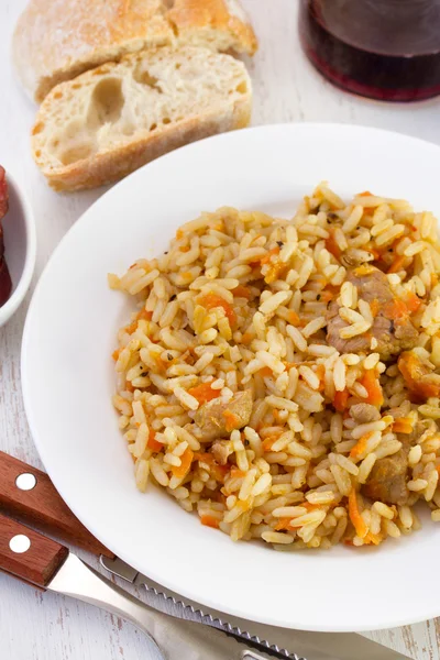 Rice with carrot and pork — Stock Photo, Image