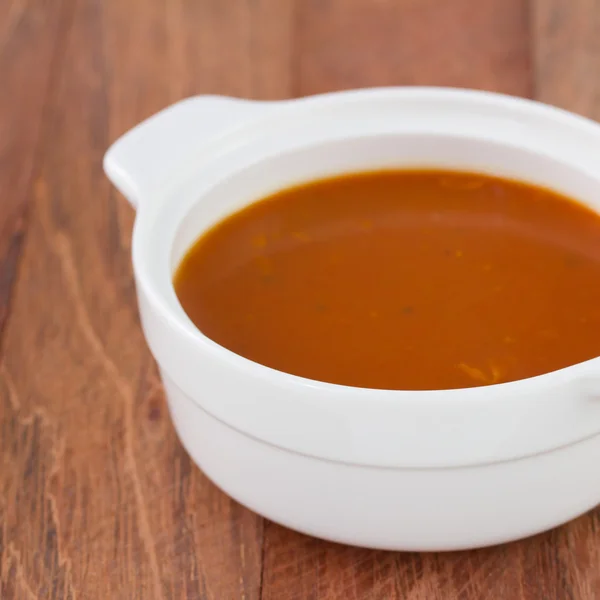 Tomato soup in white bowl — Stock Photo, Image