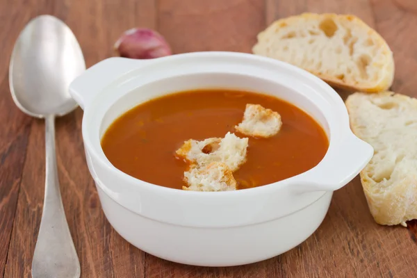 Tomato soup with bread in white bowl — Stock Photo, Image