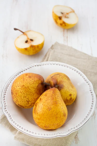 Pears in white dish — Stock Photo, Image