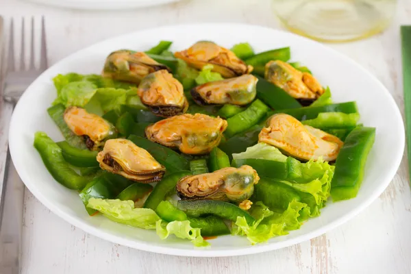 Salad with seafood on the plate — Stock Photo, Image