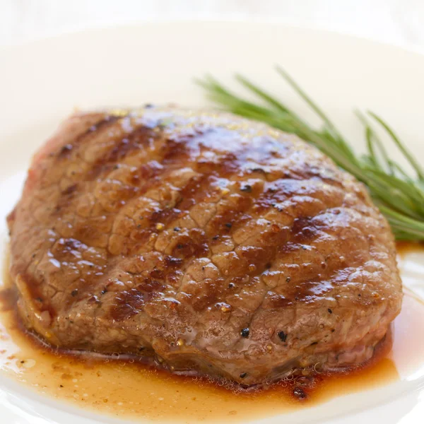 Grilled meat with rosemary — Stock Photo, Image
