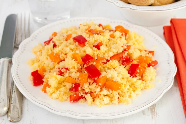 Couscous with carrot and red pepper — Stock Photo, Image