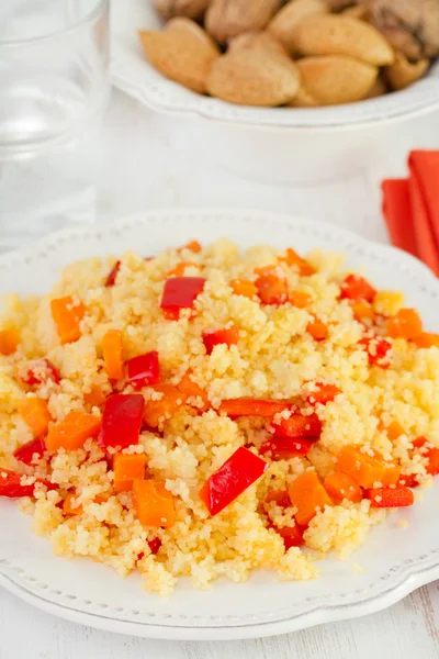 Couscous with vegetables on white plate — Stock Photo, Image