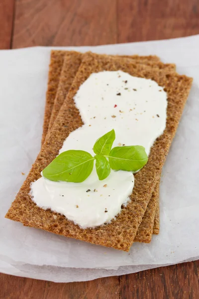 Toast with cheese and basil — Stock Photo, Image