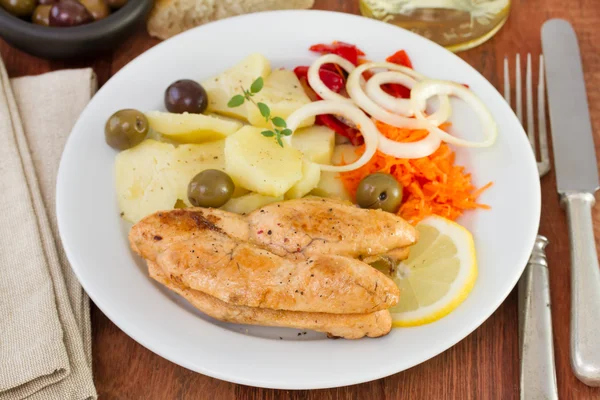 Fish eggs with potato and lemon — Stock Photo, Image