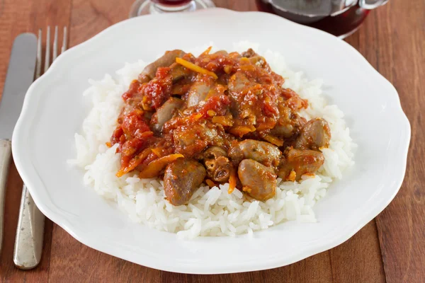 Chicken hearts with rice — Stock Photo, Image