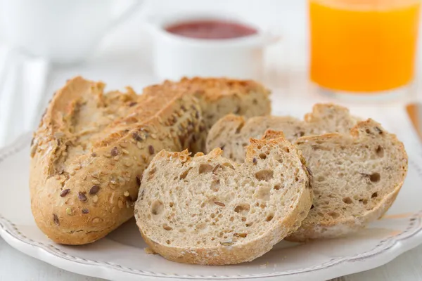 Bread with orange juice and jam — Stock Photo, Image