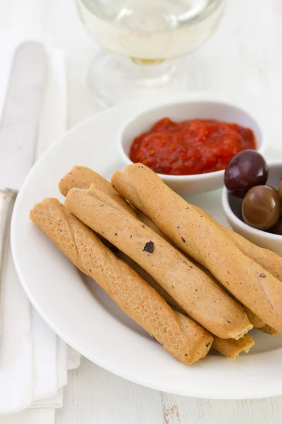 Bread stick on the plate — Stock Photo, Image