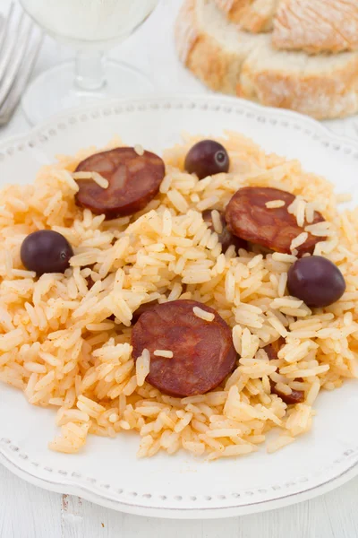 Rice with sausages on the white plate — Stock Photo, Image