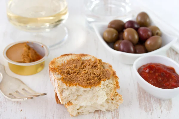 Sardine pate with bread, sauce and olives — Stock Photo, Image