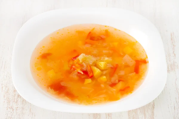 Zuppa in piatto bianco — Foto Stock