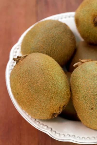 Kiwi in white dish — Stock Photo, Image