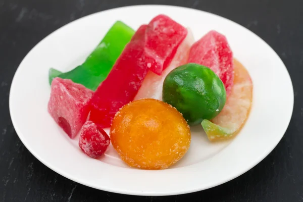 Dried fruits with sugar on plate — Stock Photo, Image