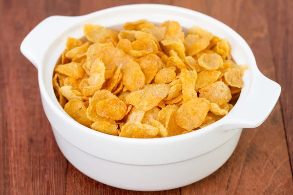 Corn flakes in bowl — Stock Photo, Image