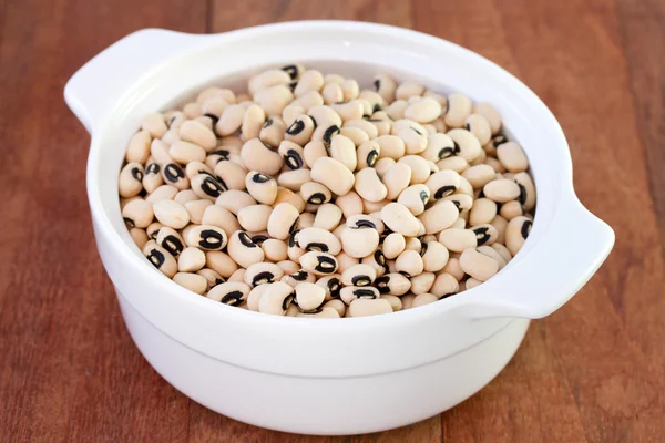 Dry beans in white bowl — Stock Photo, Image