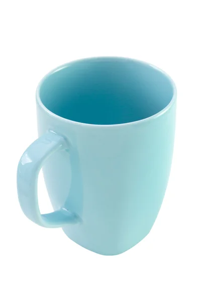 Голубая чашка на белом фоне — стоковое фото