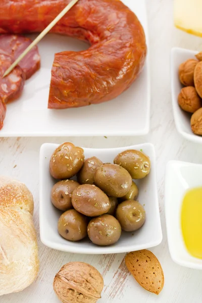 Olives with sausages and cheese — Stock Photo, Image