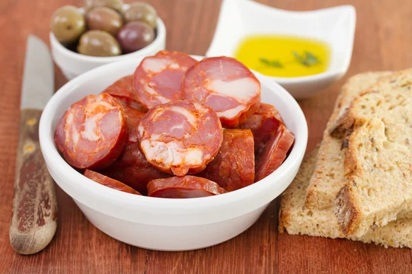 Chourico with olives and oil — Stock Photo, Image