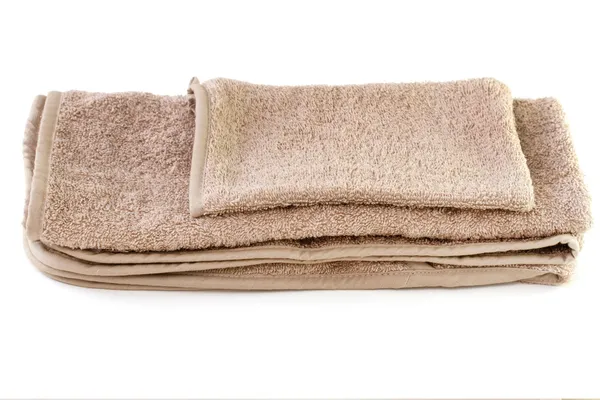 Brown towel on white background — Stock Photo, Image