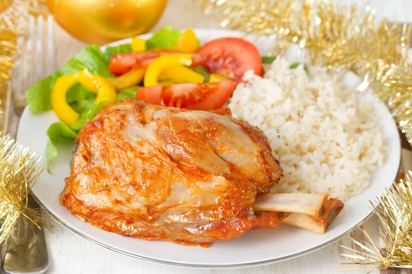 Pork with rice and salad — Stock Photo, Image
