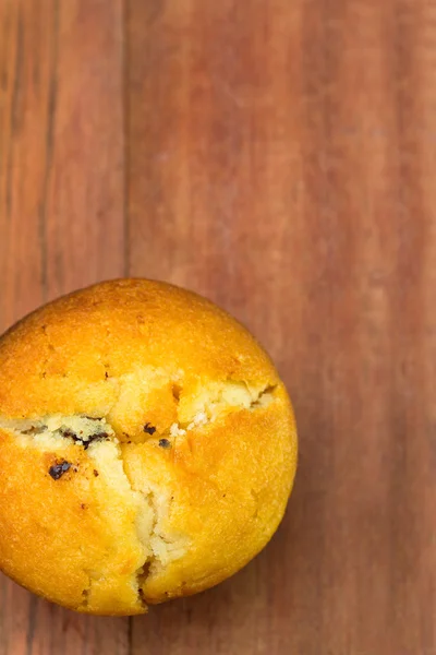 Muffin na hnědé pozadí — Stock fotografie