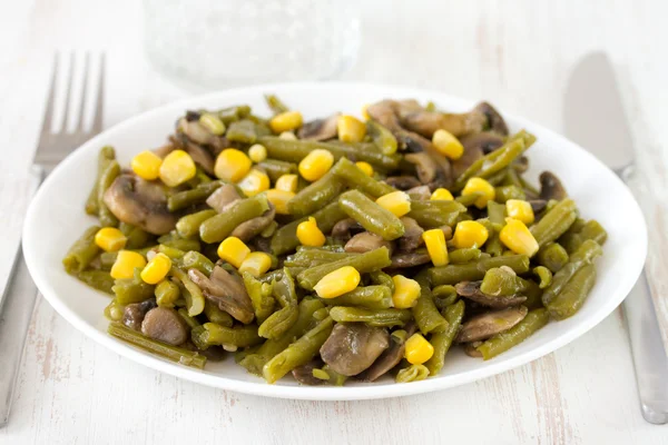 Green beans with mushrooms and corn on plate — Stock Photo, Image