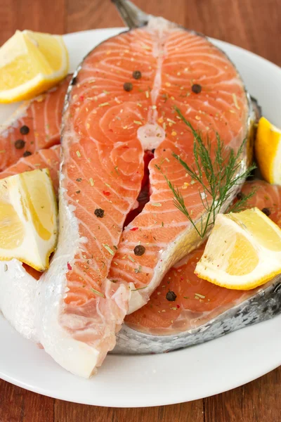 Salmon on white plate — Stock Photo, Image