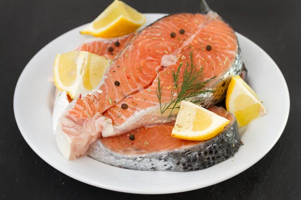 Salmon on white plate — Stock Photo, Image