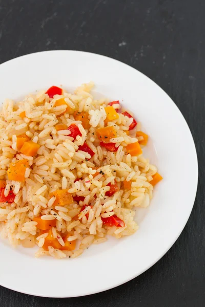 Rice with vegetables on white plate — Stock Photo, Image