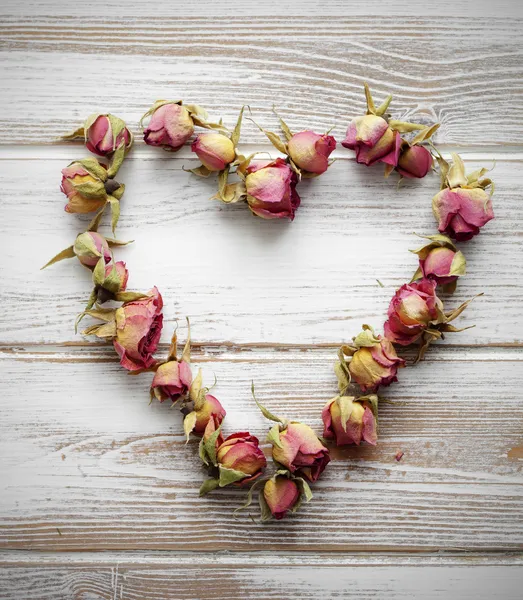 Heart from dry rose buds — Stock Photo, Image