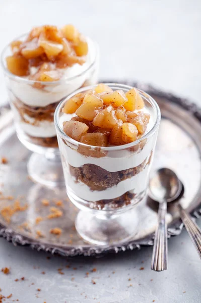 Christmas dessert with gingerbread cookies, cream and pears