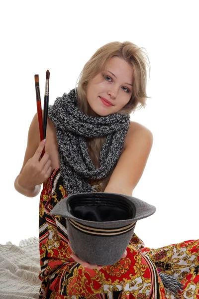 Beautiful woman artist asking for charity — Stock Photo, Image