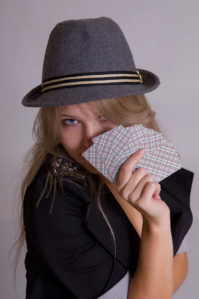 Beautiful woman playing poker — Stock Photo, Image