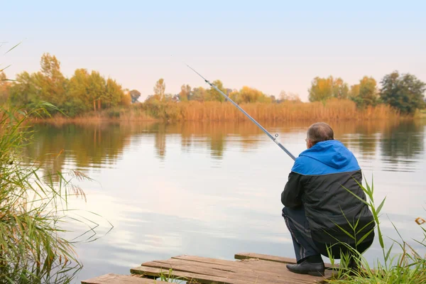 Man fishing on the lake