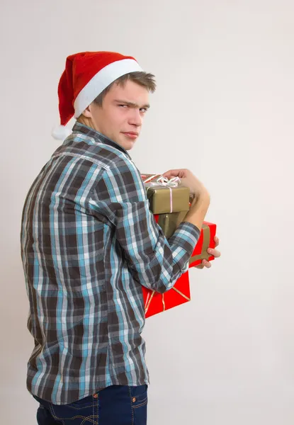 Greedy young man - Santa Claus — Stock Photo, Image