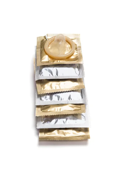 Condom packs on a white background — Stock Photo, Image