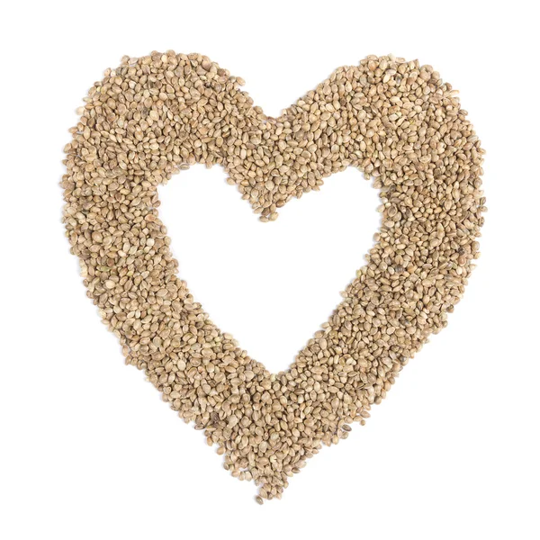 Heart from hemp seeds — Stock Photo, Image
