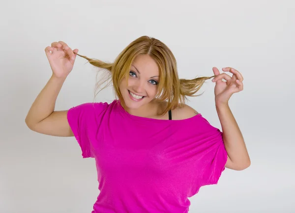 Young woman making funny faces — Stock Photo, Image