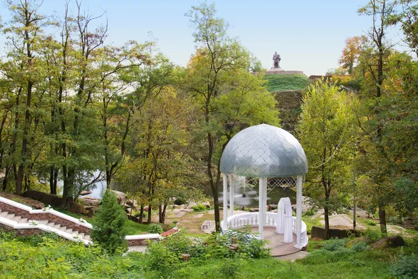 Beautiful white wedding gazebo in park — Stock Image Beautiful white wedding gazebo in park Stock Photo
