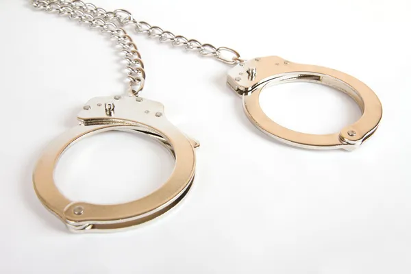 A pair of handcuffs — Stock Photo, Image