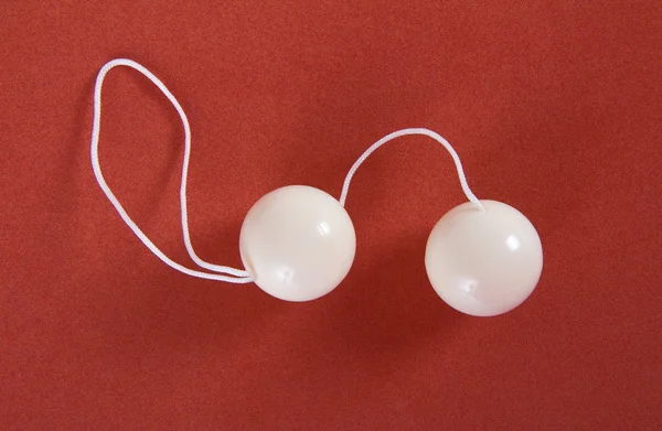 White love balls on red — Stock Photo, Image