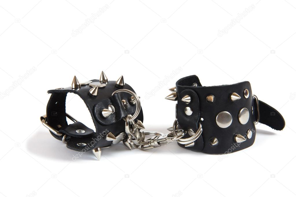 black leather handcuffs isolated