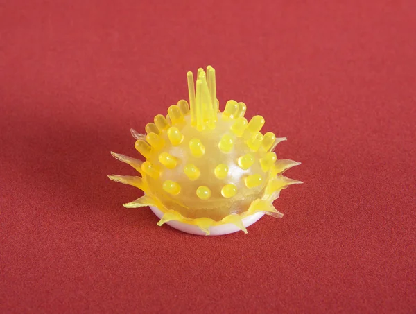 Funny yellow condom — Stock Photo, Image