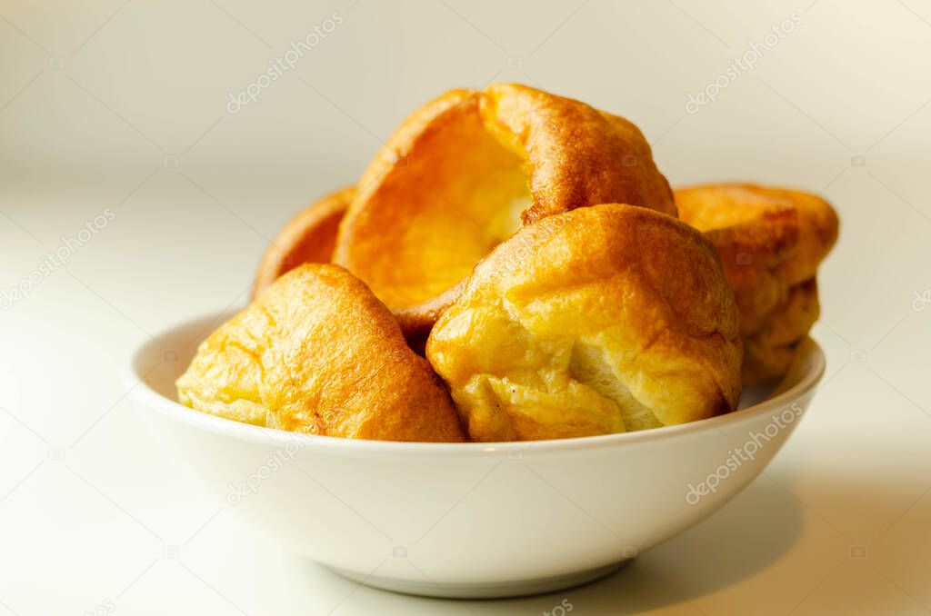 Traditional English Yorkshire pudding, wonderfully crisp and golden baked for a traditional recipe, accompaniment for the perfect Sunday roast, English food