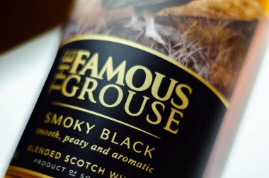 LONDON, UNITED KINGDOM - AUGUST 28, 2022 The Famous Grouse Smoky Black, a complex blend with hints of dried fruit and soft smoky notes, smooth, peaty, and aromatic