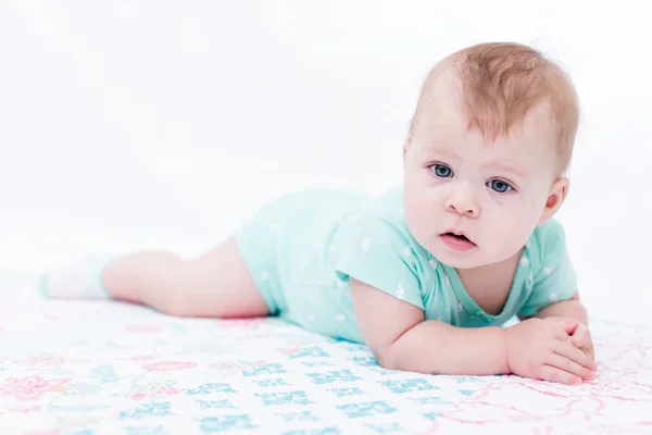Baby girl on a blanket. — Stock Photo, Image