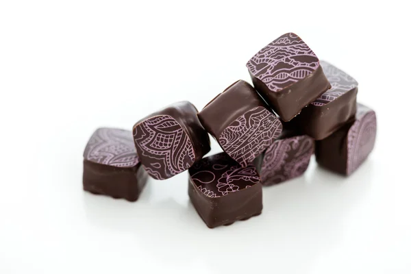 Truffles decorated with print. — Stock Photo, Image