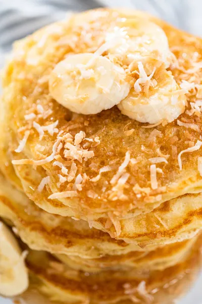 Stack Freshly Baked Coconut Banana Pancakes Garnished Sliced Bananas Toasted — Stock Photo, Image