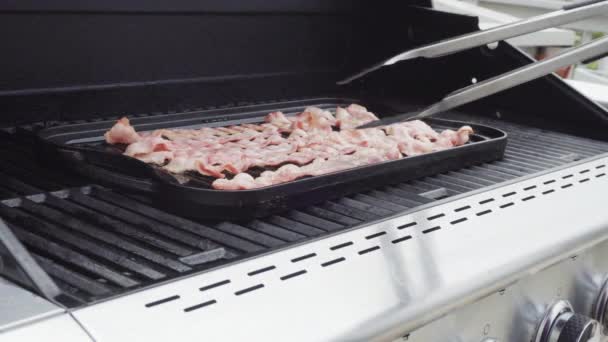 Cooking Bacon Stips Outdoor Gas Grill — Stock Video